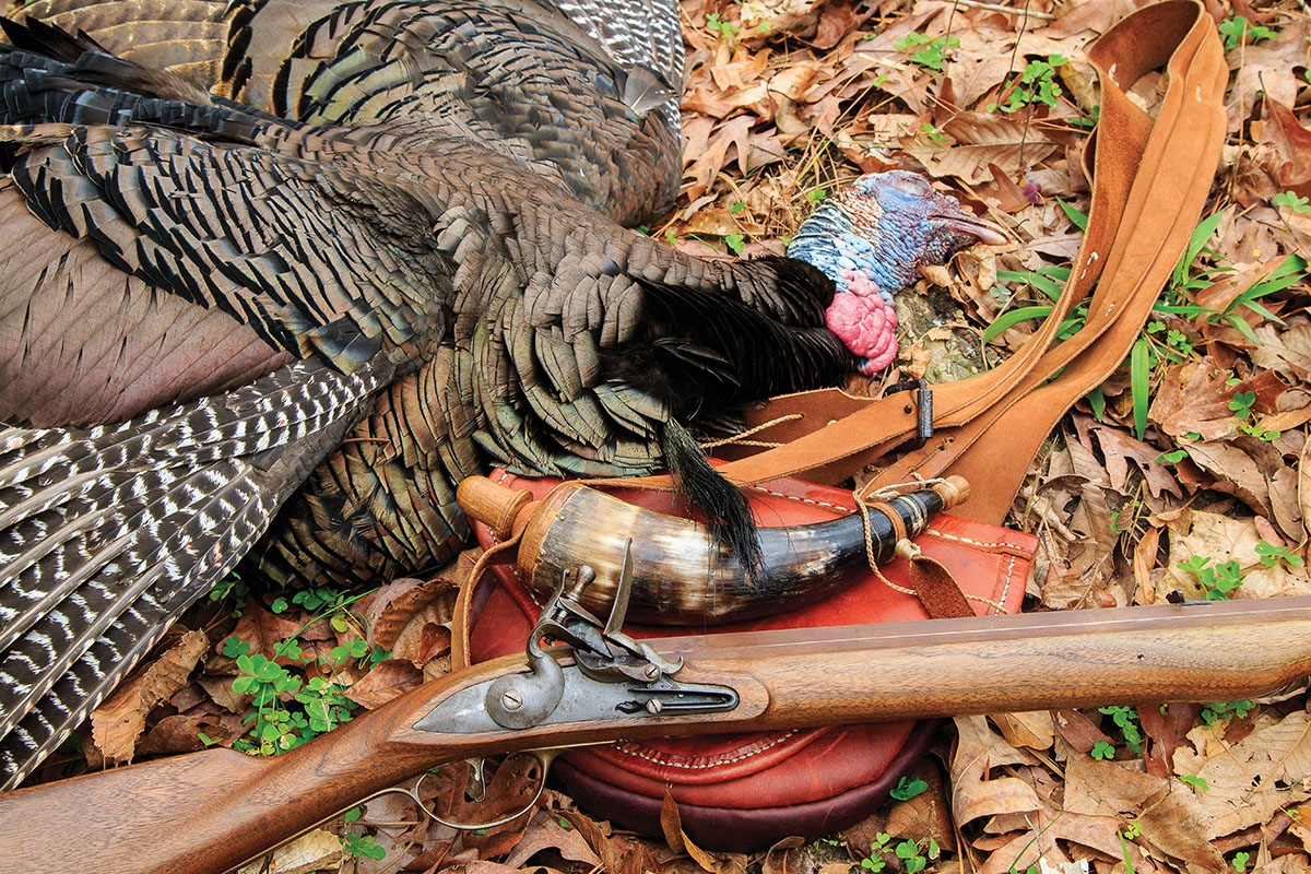 A fine fowler and an equally fine turkey.